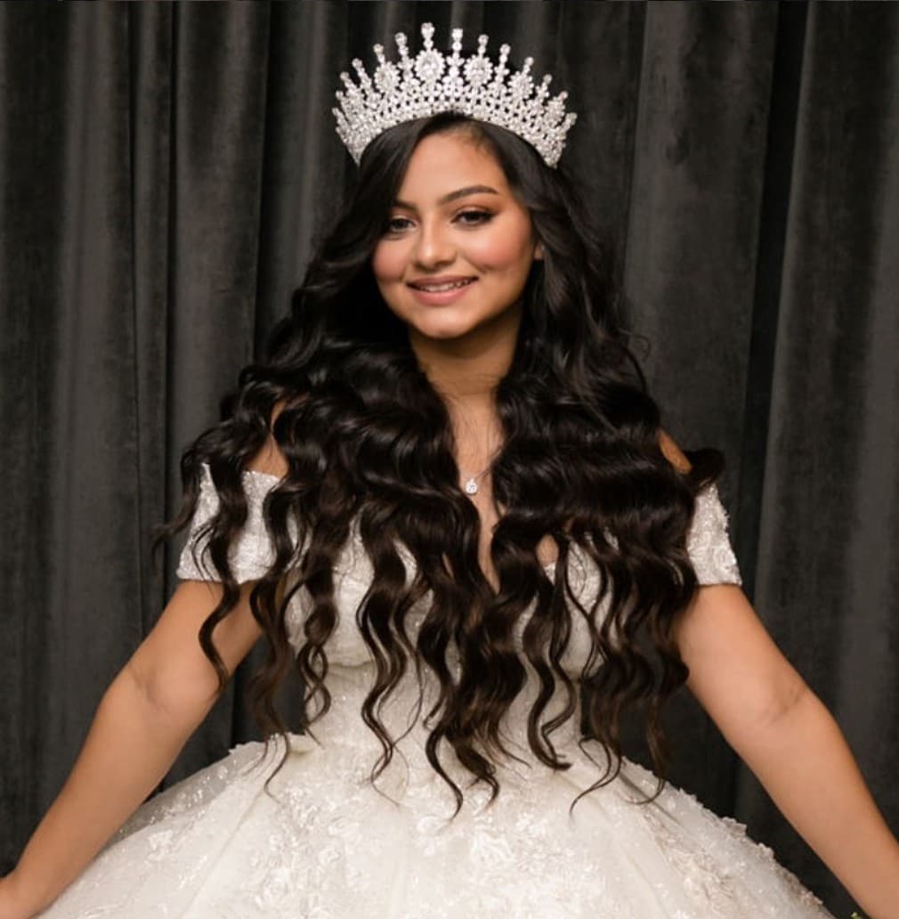 Quinceanera hairstyle with long curls and crystal tiara at R&M Salon