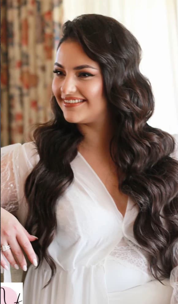 Bridal glam with voluminous curled waves styled by R&M Salon